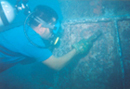 Diver cleaning underwater swivel at Zouk SBM